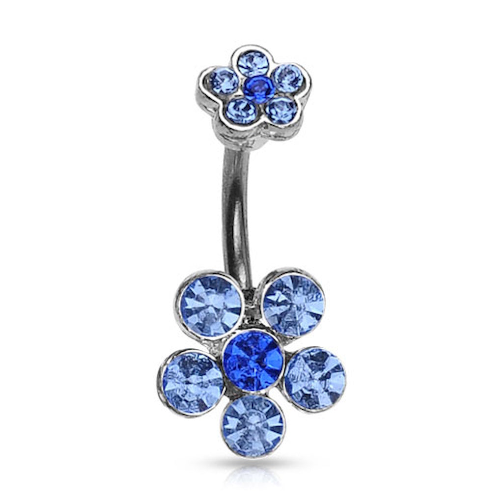 A flower belly button ring with blue gemstone petals on a white background.