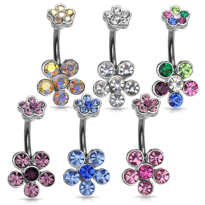 Set of six colorful flower-shaped belly button rings with different color gemstones on a white background.
