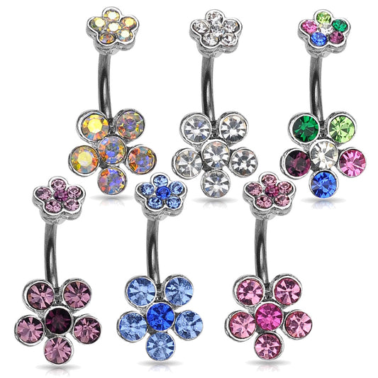 Set of six colorful flower-shaped belly button rings with different color gemstones on a white background.