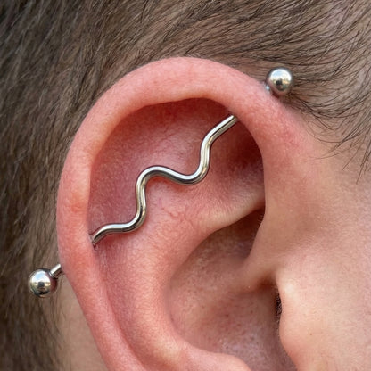 Wavy Industrial Barbell 14G 316L Surgical Steel Right Ear.